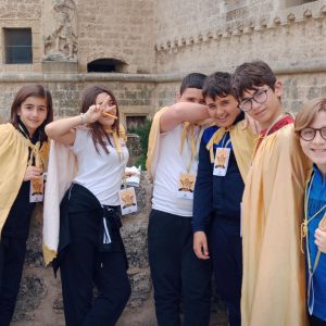 bambini con i mantelli